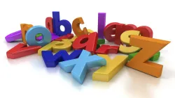 Jumbled multi-colored alphabet in a pile