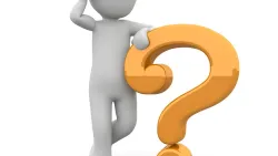 Cartoon person scratching head and standing next to question mark.